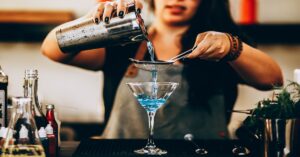 woman pouring a drink